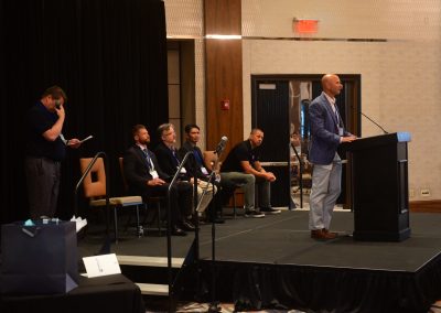 James Lippe, CEO of SaaS Alert, speaks onstage at the 2024 Cybersecurity Symposium.