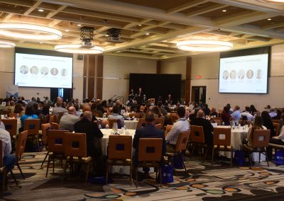 A speaker presents at the 2024 Tech Valley Cybersecurity Symposium.