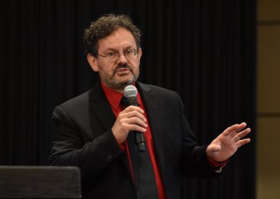 Tush Nikollaj, CEO and President of Logical Net, speaks at the 2024 Tech Valley Cybersecurity Symposium.
